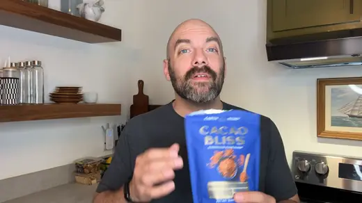Alex G. holding a bag of Cacao Bliss